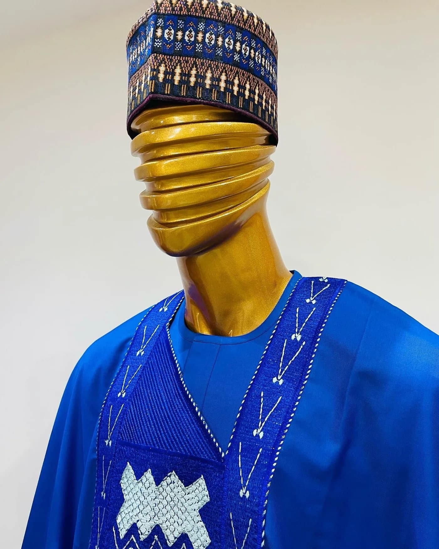 Blue agbada neckline with white embroidery
