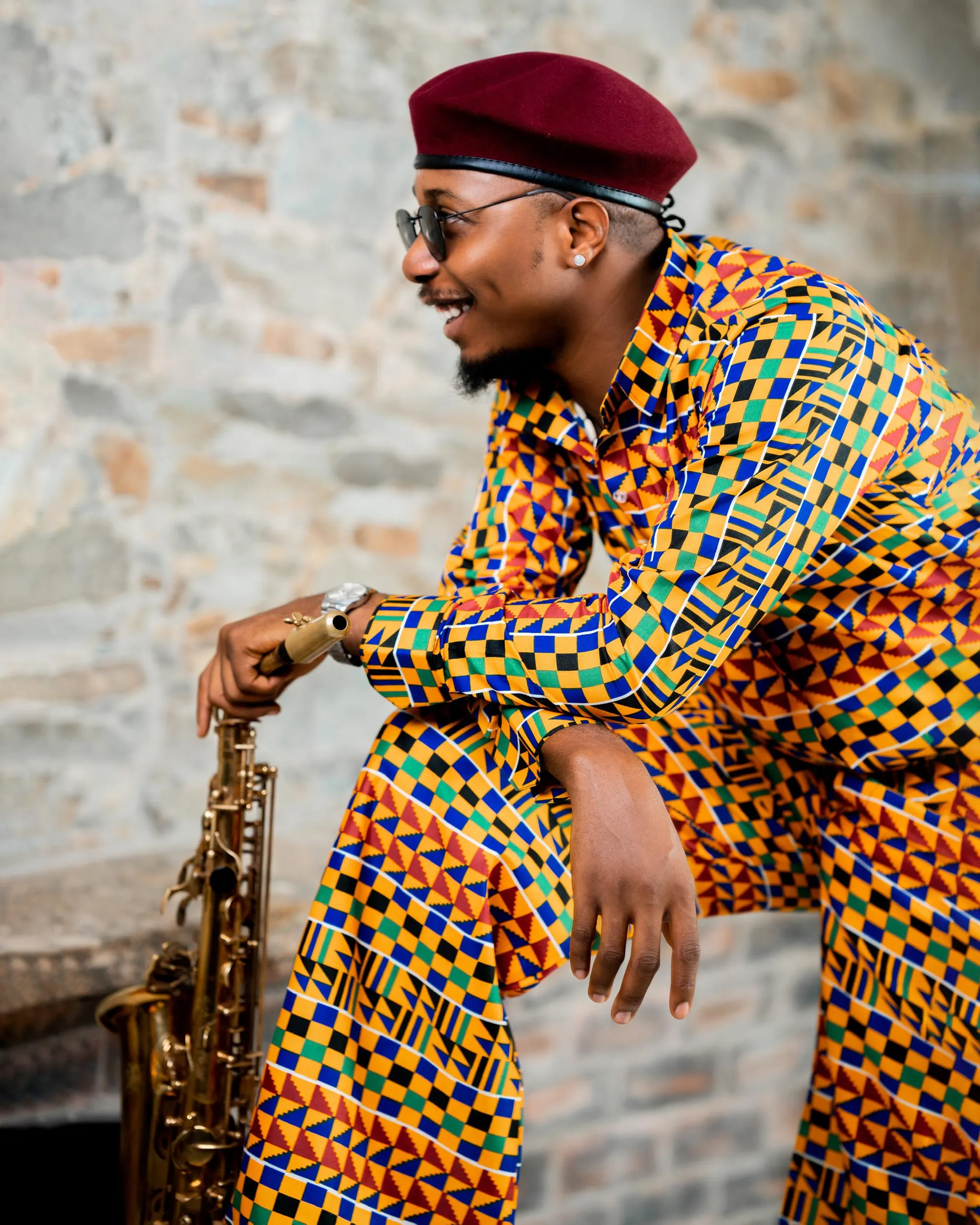 Kente set with a burgundy beret
