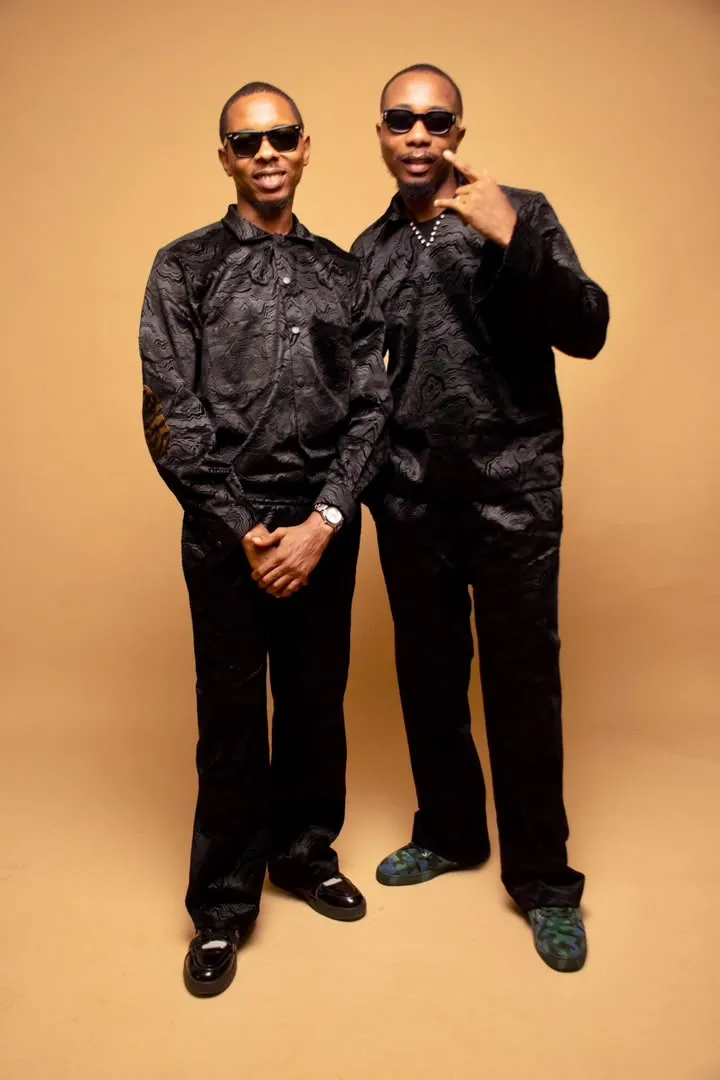 Two looks in black silk, standing