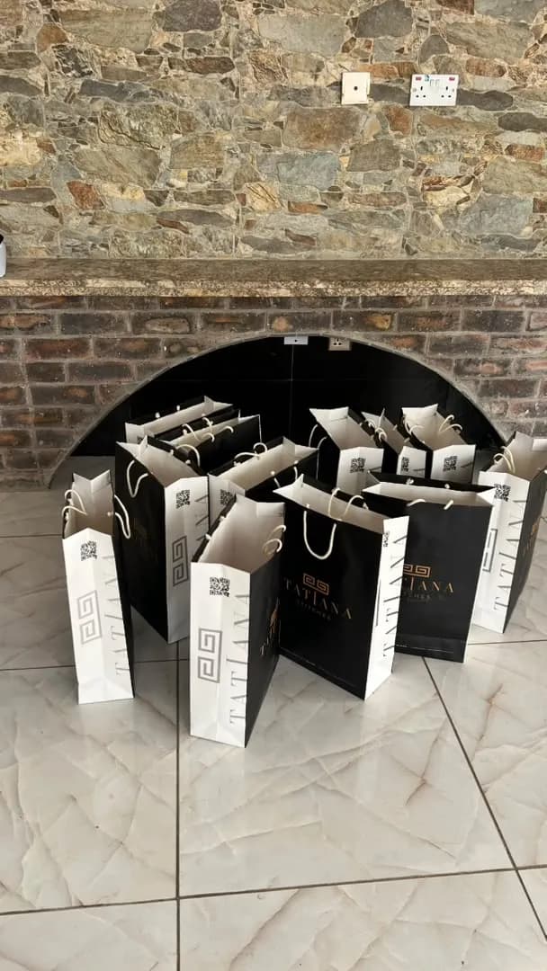 Tatiana Stitches branded shopping bags ready for pickup